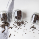 Jars of unprocessed spices (pepper, nutmeg, etc.)